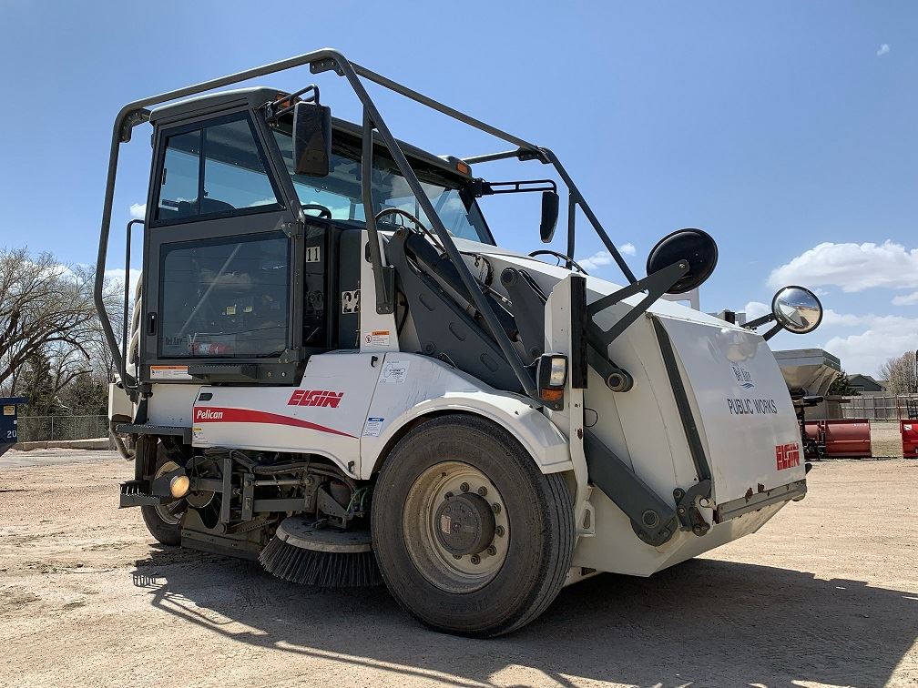 Picture of the Bel Aire Street Sweeper with a blue sky in the background.