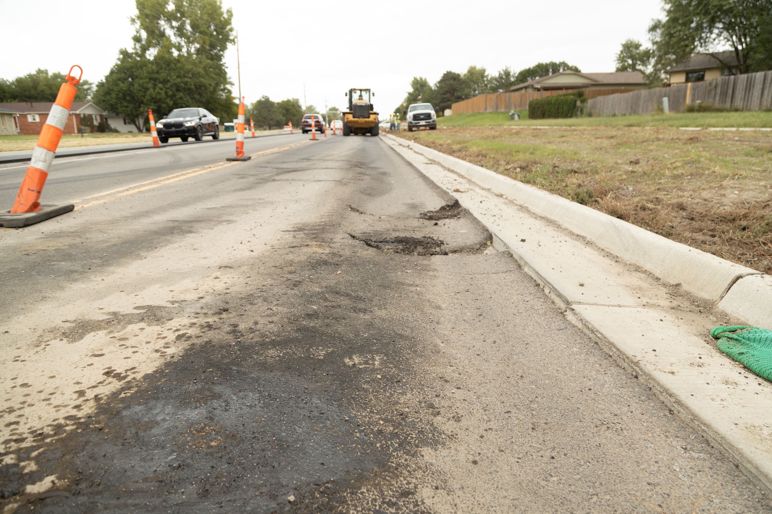 Defects during Woodlawn construction showing large cracks and potholes